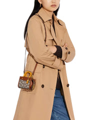 on-model-Coach-Rogue-12-Cocoa-Burnished-Amber