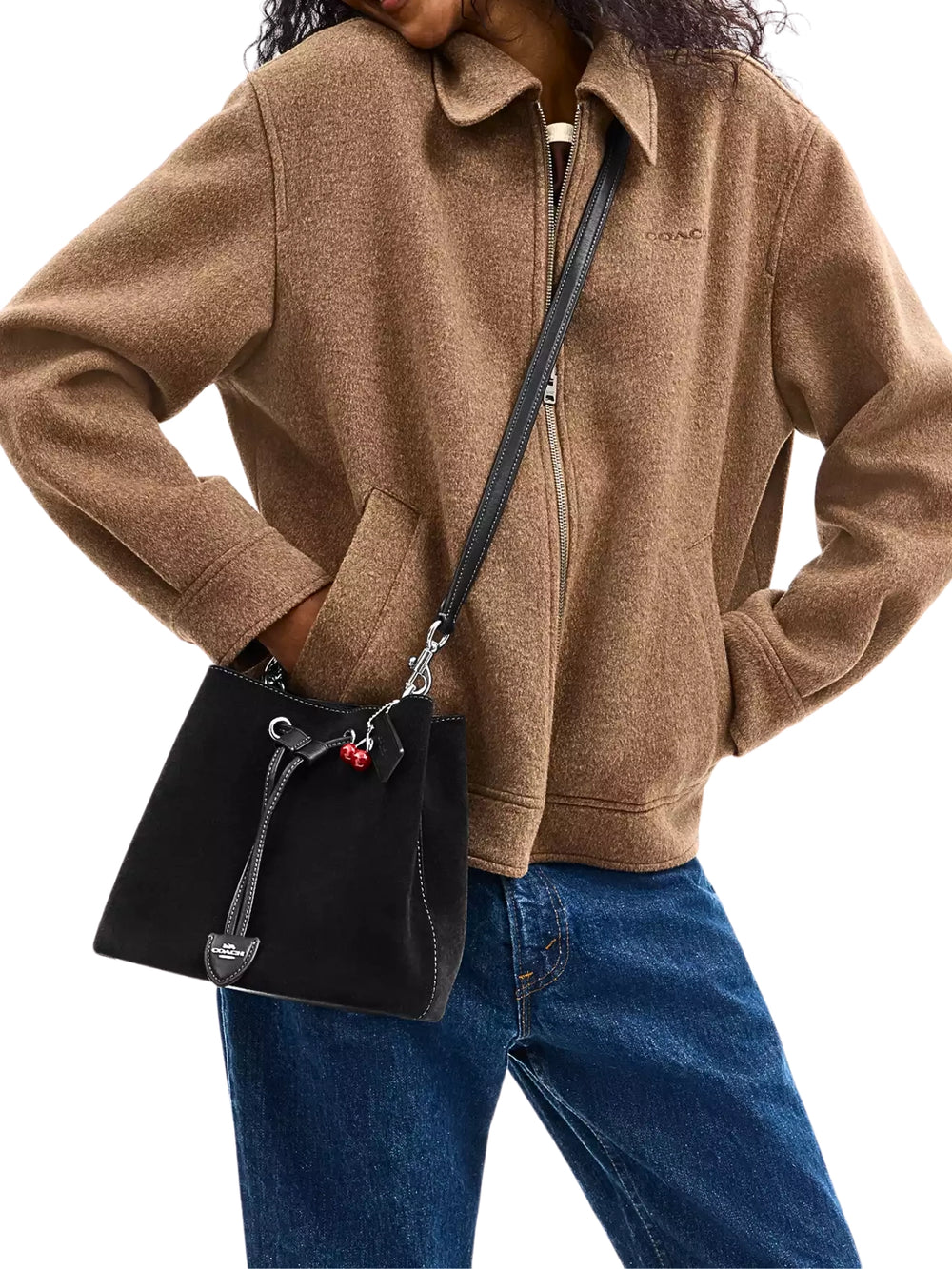 on-model-Coach-Rowan-Bucket-Bag-With-Cherry-Charm-Black