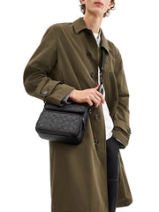 on-model-Coach-Sullivan-Flap-Crossbody-Bag-In-Signature-Canvas-Charcoal-Black