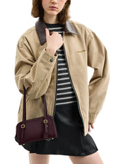 on-model-Coach-Swing-Zip-Bag-20-Blackcurrent