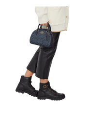 on-model-Coach-Sydney-Satchel-in-Signature-Chambray-Denim-Multi-balilene_2