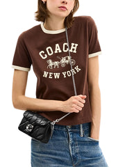 on-model-Coach-Tabby-Chain-Crossbody-Bag-19_-With-Quilting-Black