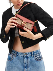 on-model-Coach-Tabby-Shoulder-Bag-20-In-Signature-Canvas-Tan-Rust