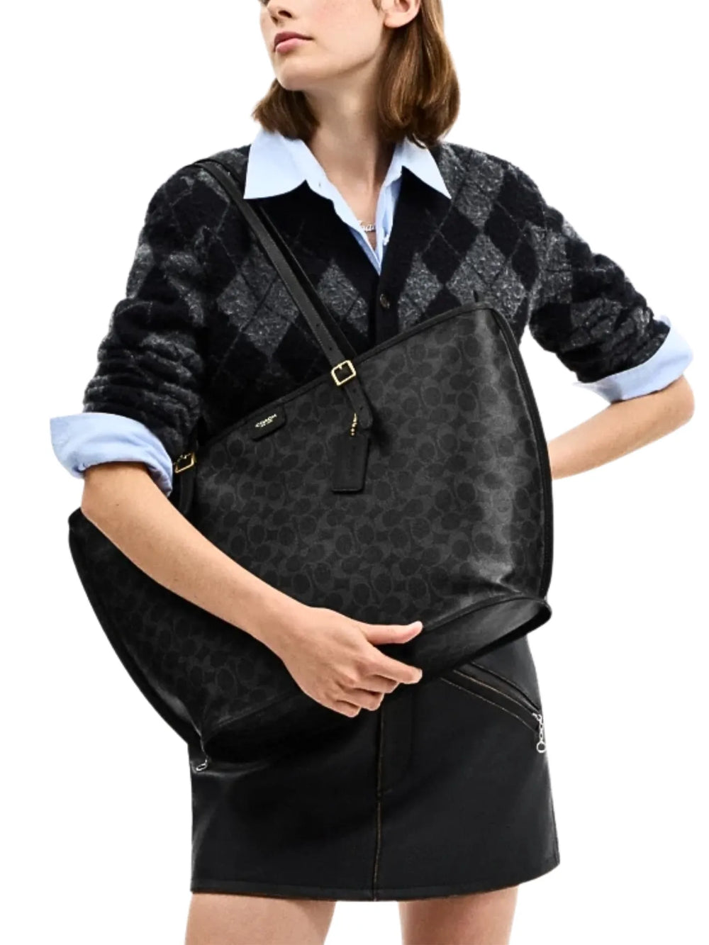 on-model-Coach-Taxi-Tote-Bag-In-Signature-Canvas-Black