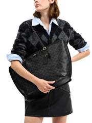 on-model-Coach-Taxi-Tote-Bag-In-Signature-Canvas-Black