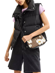 on-model-Coach-Teri-In-Signature-Canvas-With-FloraL-Print-Tan-Multi