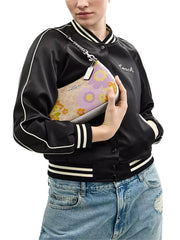 on-model-Coach-Teri-Shoulder-Bag-In-Signature-Canvas-With-Floral-Print-Sand-Multi