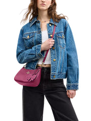 on-model-Coach-Teri-Shoulder-Bag-With-Bow-Charm-Pink