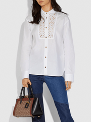 on-model-Coach-Troupe-Carryall-In-Signature-Canvas-Tan