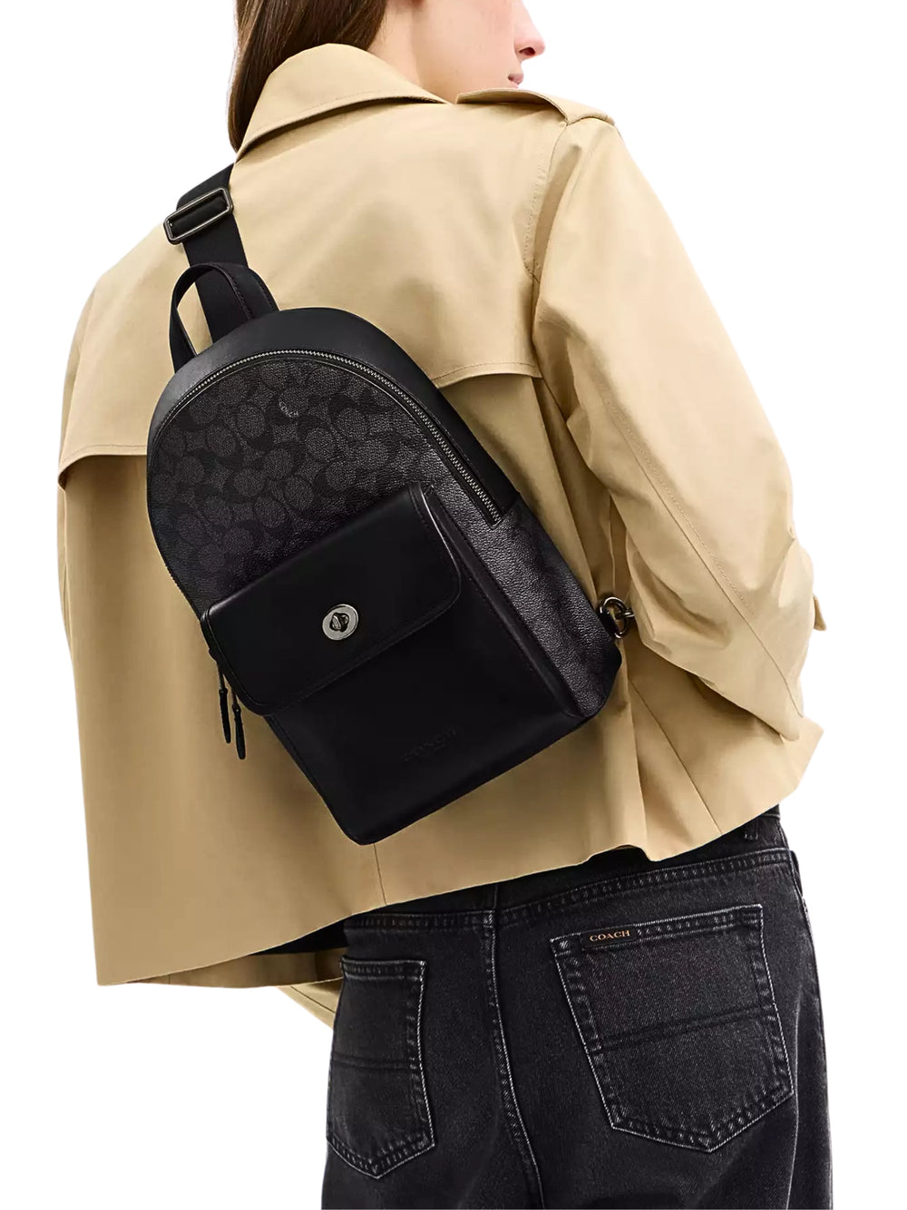 on-model-Coach-Turnlock-Sling-Pack-In-Signature-Canvas-Charcoal-Black
