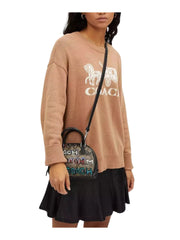 on-model-Coach-X-Mint-Serf-Sydney-Satchel-In-Signature-Canvas-KhakiMultiWEBP