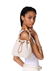 on-model-Kate-Spade-Kip-Canvas-Bucket-Bag-Light-Fawn-Multi