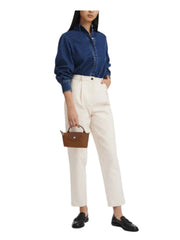 on-model-Longchamp-Le-Pliage-Green-Pouch-With-Handle-CognacWEBP