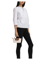 on-model-Longchamp-Le-Pliage-Original-Pouch-With-Handle-Paper