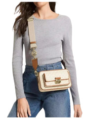 on-model-Michael-Kors-Bradshaw-Medium-Logo-Camera-Bag-Vanilla