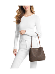 on-model-Michael-Kors-Pratt-Medium-Signature-Logo-Shoulder-Bag-Brown