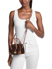 on-model-Michael-Kors-Thompson-Extra-Small-Signature-Logo-Convertible-Satchel-Bag-Brown