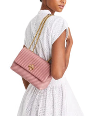 on-model-Tory-Burch-Kira-Moto-Quilt-Small-Convertible-Shoulder-Bag-Pink-Magnolia