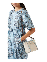 on-model-Tory-Burch-McGraw-Small-Canvas-Bucket-Bag-Natiral-Sea-BubbleWEBP
