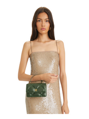 on-model-Tory-Burch-Mini_Kira_Diamond_Quilt_Top_Handle_Chain_Wallet