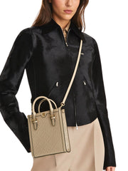 on-model-Tory-Burch-T-Monogram-Leather-Mini-Tote-Fresh-Clay