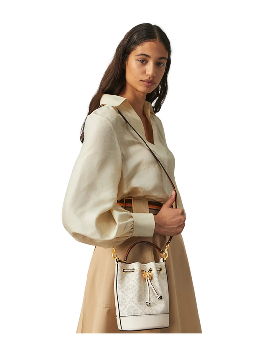 on-model-Tory-Burch-T_Monogram-Perforated-Leather-Mini-Bucket-Bag-Ivory