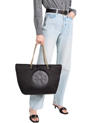 on-model-Tory-Ella-Burch-Puffy-Chain-Tote-Bag-Black