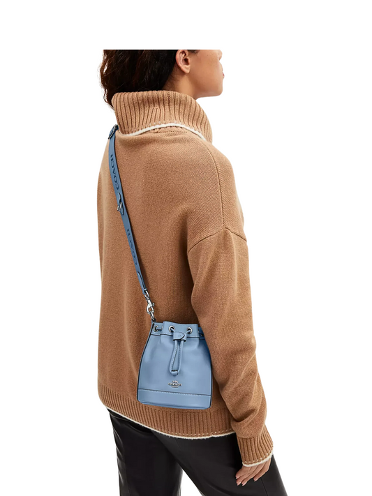 on-model-crossbody-Coach-Mini-Bucket-Bag-Blue