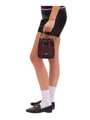 on-model1-Coach-Dempsey-Drawstring-Bucket-Bag-in-Signature-Canvas-Leather-Oxblood-MultiWEBP