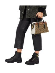 on-model1-Coach-Signature-Mini-Darcie-Carryall-Crossbody-Bag-Khaki-MultiWEBP