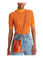 on-model1-Tory-Burch-T-Monogram-Patent-Embossed-Mini-Bucket-Bag-Spring-SpiceWEBP