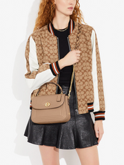 on-model2-Coach-Marlie-Top-Handle-Satchel-With-Border-Quilting-Taupe