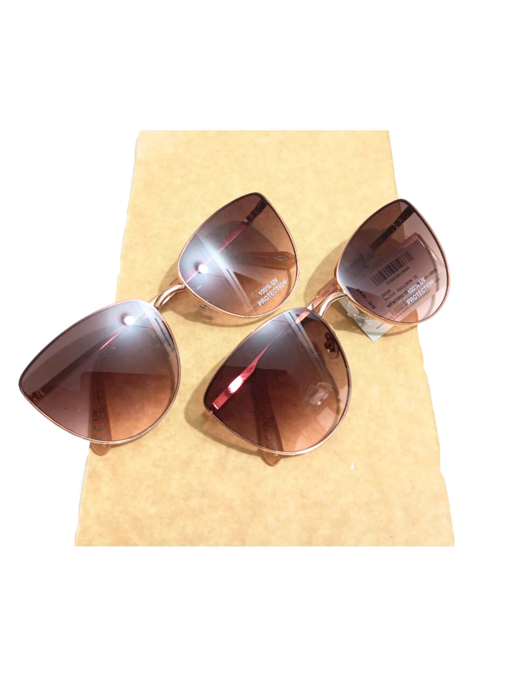 on-produkk01-Fossil-X82528-Cat-Eye-Sunglasses-Rose-GoldWEBP