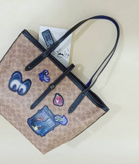 Coach 31160 Disney Signature Multi Patches Market Tote Tan Black