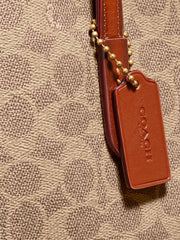 Coach Charlie Carryall 28 In Signature Canvas Tan Rust