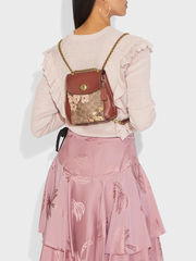 Coach 53087 Parker Convertible Backpack 16 In Signature Canvas With Prairie Floral Print Tan Rust Bow