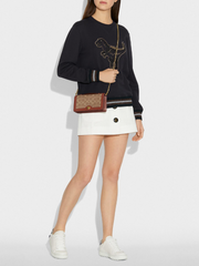 Coach 68312 Riley Chain Clutch In Colorblock Signature Canvas Tan Rust