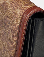 Coach 76264 Saddle Belt Bag In Colorblock Signature Canvas In Tan Rust