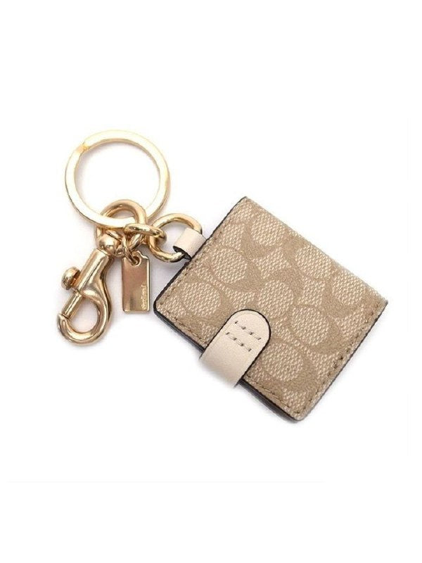 Coach-77675-Frame-Bag-Charm-Signature-Light-Chalk-bagian-belakang