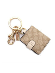 Coach-77675-Frame-Bag-Charm-Signature-Light-Chalk-bagian-belakang