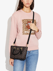 Coach-Alice-Satchel-In-Signature-Canvas-Brown-Black-Balilene-onmodel1