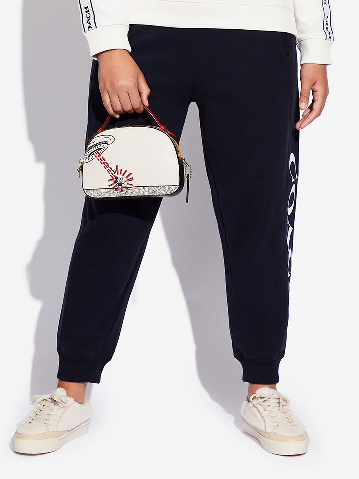 Coach-C6976-Disney-Mickey-Mouse-X-Keith-Haring-Serena-Satchel-Gold-Chalk-Multi-Balilene-onmodel1