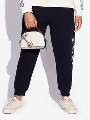 Coach-C6976-Disney-Mickey-Mouse-X-Keith-Haring-Serena-Satchel-Gold-Chalk-Multi-Balilene-onmodel1