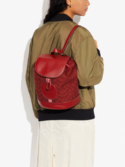 Coach Dempsey Drawstring Backpack In Signature Jacquard With Stripe And Coach Patch Red Apple Multi