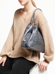 Coach-F31698-Edie-Shoulder-Bag-31-In-Signature-Canvas-Midnight-Navy-Balilene-onmodel1
