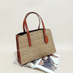 Coach 31210 Charlie Carryall In Signature Canvas Rust