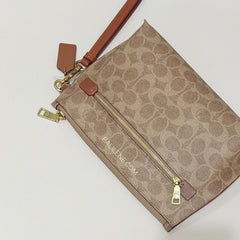 Coach 68332 Charlie Pouch In Signature Colorblok Tan Rust