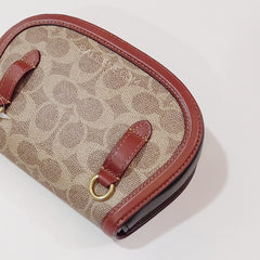 Coach 76264 Saddle Belt Bag In Colorblock Signature Canvas In Tan Rust