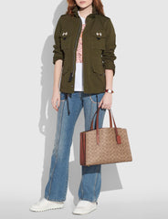 Coach 31210 Charlie Carryall In Signature Canvas Rust