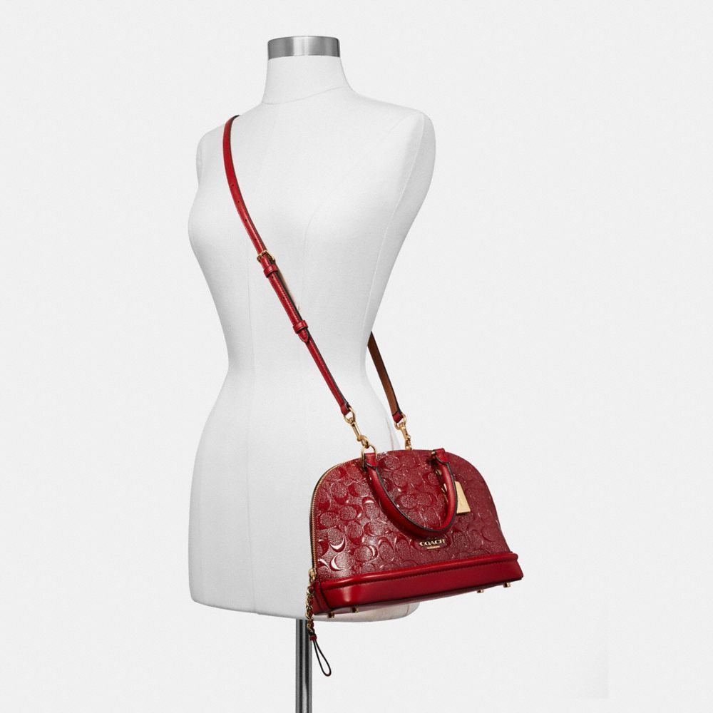Coach Dark Red Signature Embossed Patent and Leather Mini Sierra